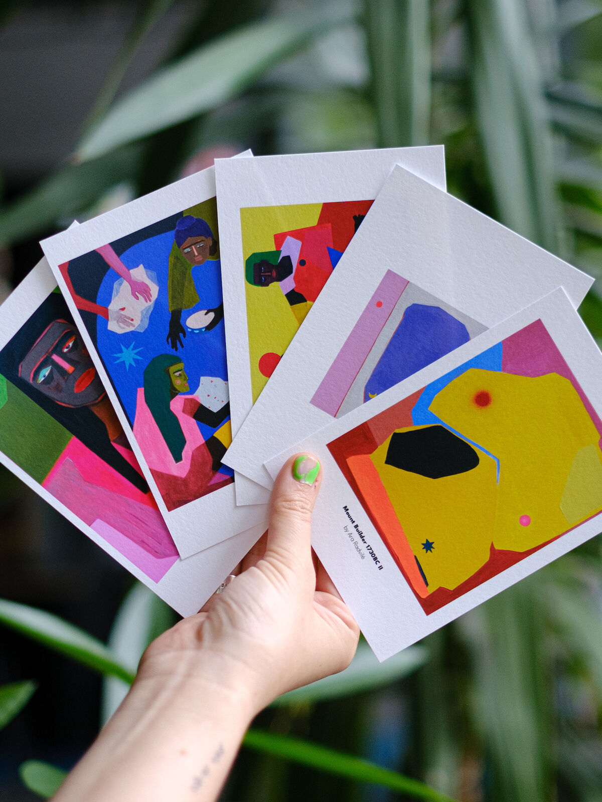 Postcard set ”Volver” in hand